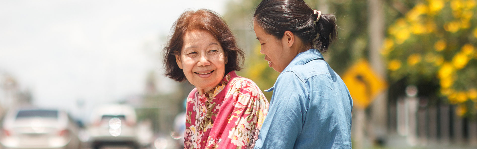 Daughter outside with her stroke survivor mother