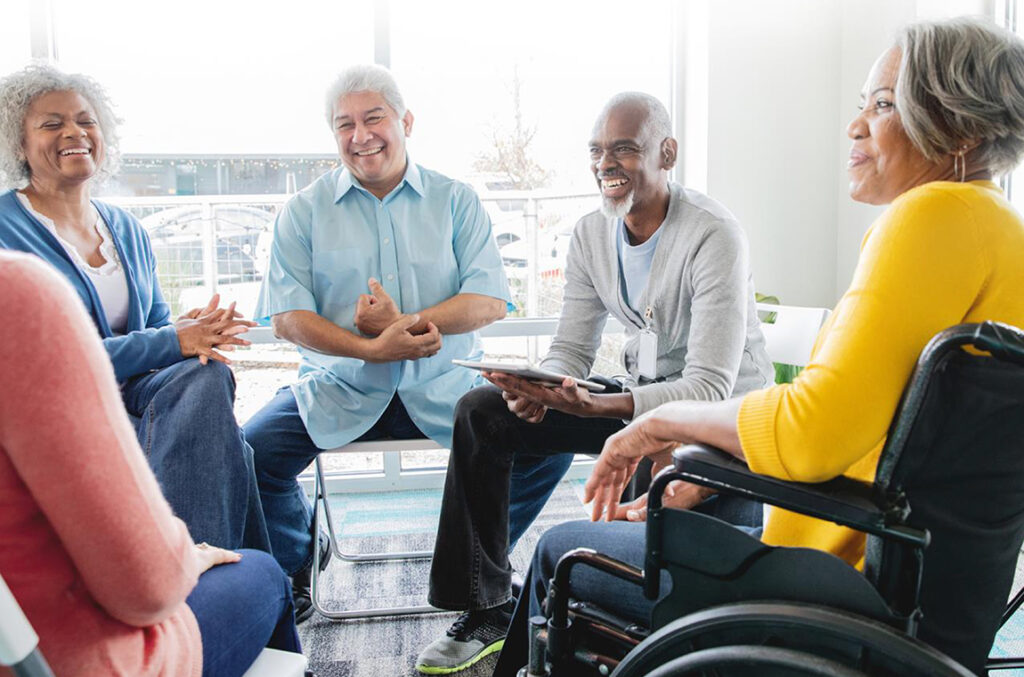 After Stroke Peer Support Group participants talking in a circle